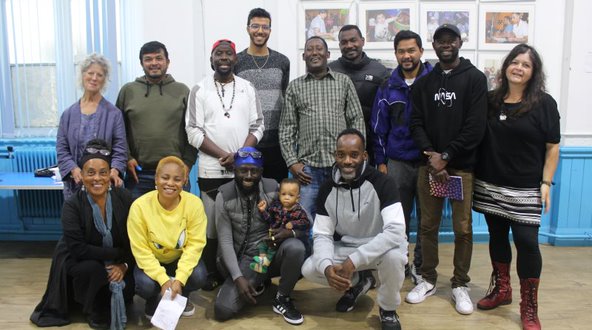 A group of people standing together for a posed photo